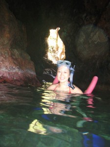 woman snorkeling in the caves